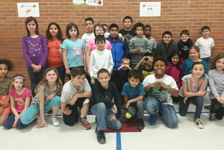 Group of school children pose as a group from Michener elementary school.